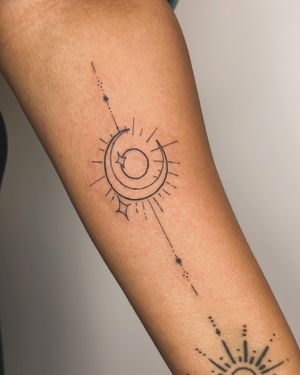 Unique and minimalistic tattoo featuring a sun, moon, and star motif, created by the talented artist jadeshaw_tattoos.