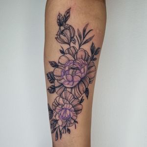 Experience the beauty of nature with this stunning illustrative flower tattoo created by the talented artist, Belle Tannahill.