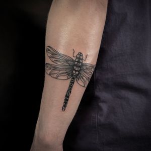 Get inked by the talented Jenny Dubet with this stunning and detailed dragonfly design. Perfect for nature lovers!
