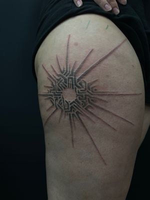 Elegant dotwork tattoo featuring a geometric star pattern, expertly done by the talented artist Julia Bertholdi.