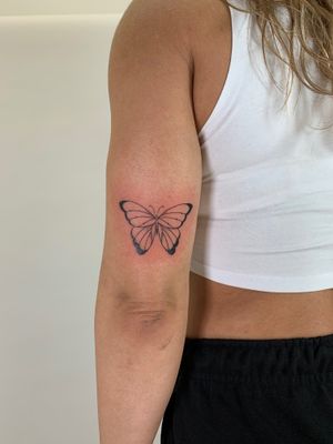 Get a stunning illustrative butterfly tattoo by Chloe Hartland that will captivate and mesmerize.