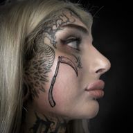 Scythe Face Tattoo