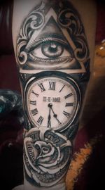 clock and eye in pyramid