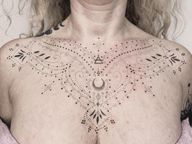 Symmetrical Chest Tattoo