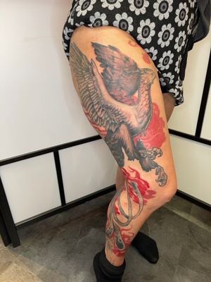 A standing shot of this giant phoenix the tails sweep behind the knee so it was very difficult to get a full shot in one picture of this massive tattoo