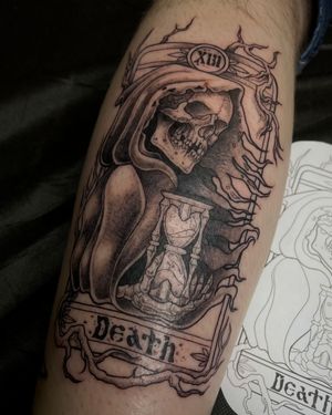Unique tattoo by Kat Jennings featuring a detailed and artistic interpretation of the Death tarot card with a grim reaper motif.