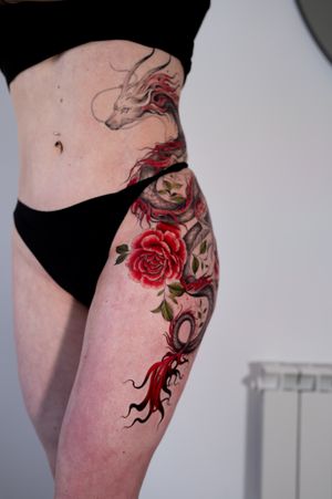 Get a stunning anime-inspired tattoo featuring a Studio Ghibli rose by tattoo artist Ion Caraman. A blend of illustrative style and floral motif.