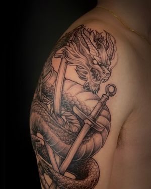 Capture the power and mystique of a dragon with this stunning illustrative tattoo by Kat Jennings.