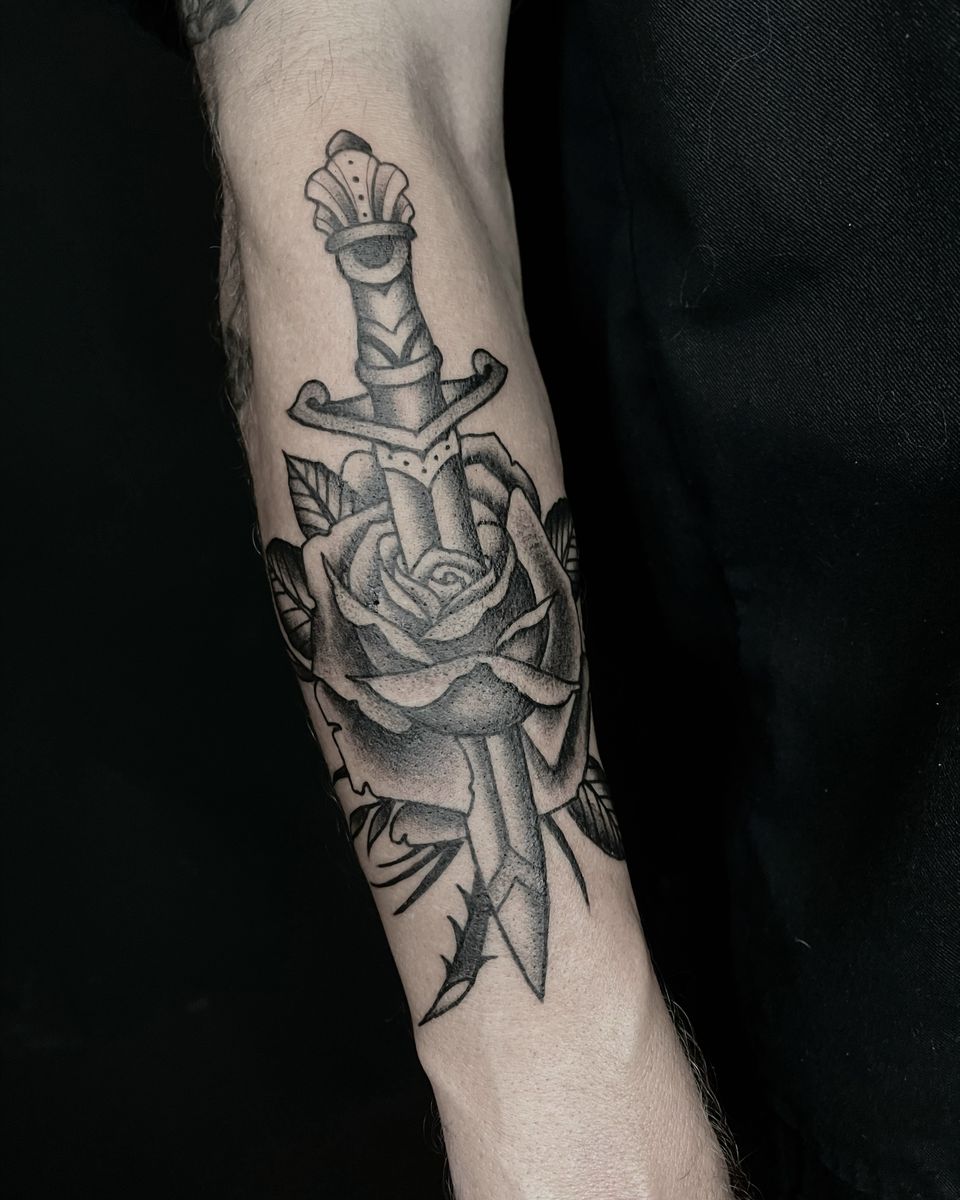 Tattoo uploaded by Nate Fierro • Traditional Black and Grey Rose and dagger Tattoo by Nate