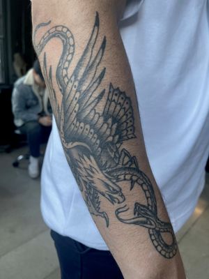 Black and grey Traditional Eagle vs. Snake tattoo by Nate Fierro @natefierro #traditional #traditionaltattoo #snaketattoo #eagletattoo #blackandgrey #blackandgreytattoo