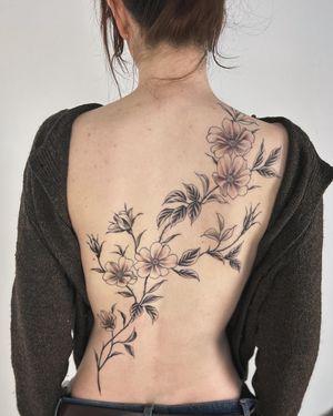 Beautifully detailed flower and vine design by Paula, combining nature with artistry. Perfect for those who appreciate intricate tattoos.