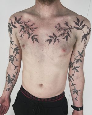 Get a stunning illustrative tattoo of a flower vine by the talented artist Paula. Perfect for adding a touch of nature to your body art.