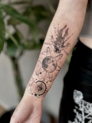 Explore the depths of the universe with this stunning black and gray geometric tattoo by Saka Tattoo, featuring a moon, astronaut, and eye in micro-realism style.
