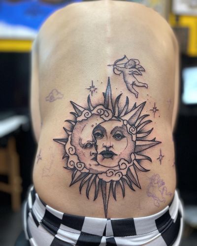 First session of this classic sun & moon lower back piece 