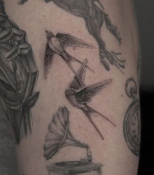 Admire the beauty of a black and gray illustrative bird tattoo, expertly inked by HellHabits. Symbolizing freedom and loyalty.