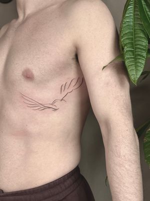 Fly high with this illustrative dove tattoo by Saka Tattoo, symbolizing peace and freedom. A graceful addition to your body art collection.