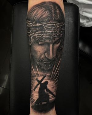 Explore the beauty of faith with this stunning black and gray cross tattoo, perfectly executed by Simon Says Ink.