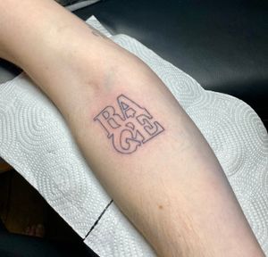 Get a unique fine line hand-poked lettering tattoo by talented artist Charlotte Pokes for a stylish and personalized look.