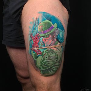Get inked with a vibrant illustrative tattoo of the Riddler from DC Comics, created by the talented artist Marie Terry.