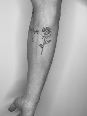 Elegant and detailed fine line illustrative rose tattoo by the talented artist Timmy. Perfect for those looking for a delicate and timeless design.
