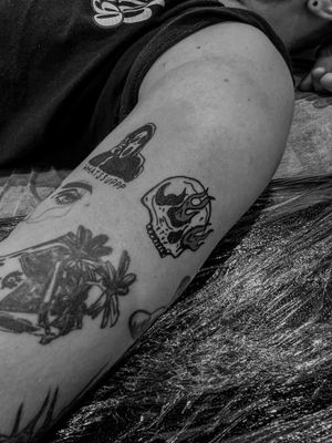 Unique blackwork tattoo featuring ghostface skull in patchwork style, expertly done by talented artist Oliver Soames.