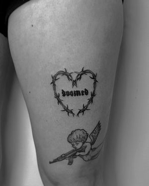 Express your emotions with this unique lettering tattoo featuring a heart and barbed wire motif by the talented artist Oliver Soames.