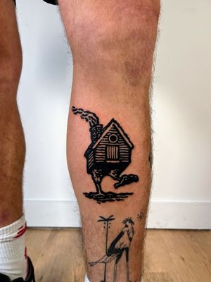 Get inked with this eerie blackwork monster house design by the talented artist Dave Norman. A unique and haunting piece for your collection.