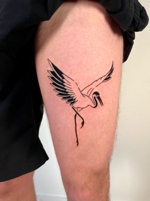 Admire the beauty of nature with this stunning heron tattoo by Dave Norman. Perfect for bird lovers!