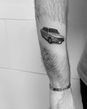 Get a stunning black and gray tattoo of a vintage Lada Niva or Paykan by the talented artist Rollo. Perfect for car enthusiasts!