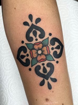 Beautiful ornamental and traditional tattoo featuring a Tudor rose flower motif, designed by Clara Colibri. Perfect for lovers of intricate designs.