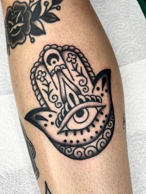 This stunning illustrative hamsa tattoo by Clara Colibri embodies protection and positivity. Let your body be a canvas for this beautiful and meaningful design.
