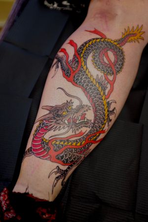 Experience the power and beauty of a traditional Japanese dragon tattoo by the skilled hands of artist Martin Kirke.