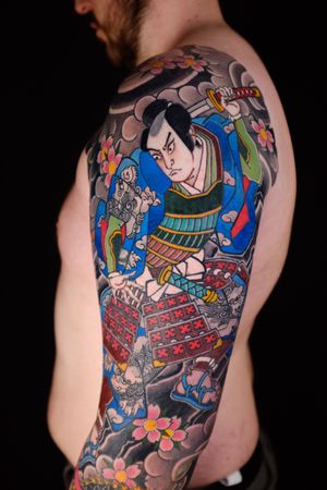 Immerse yourself in the tradition of Japanese art with this striking samurai tattoo design by the talented artist Martin Kirke. Honor the warrior spirit with this unique piece of body art.