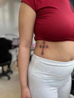 A stunning illustrative cross design by the talented artist Faith Llewellyn. Perfect for showcasing your faith in a unique and artistic way.
