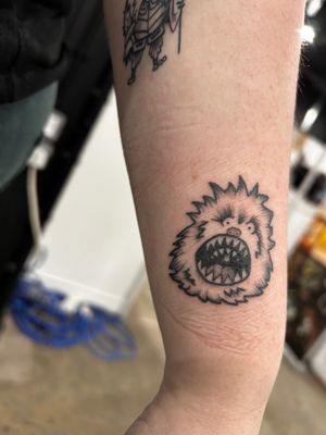 Get a unique illustrative tattoo of Fizzgig from The Dark Crystal by talented artist Jonathan Glick. Embrace the whimsical charm of this beloved character!