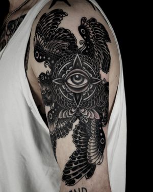 Get inked with a stunning blackwork illustration of a powerful seraphim angel, expertly designed by tattoo artist Lukey Wolf.
