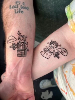 Ignite your inner geek with this illustrative tattoo featuring Han Solo and Princess Leia in Lego style by Jonathan Glick.