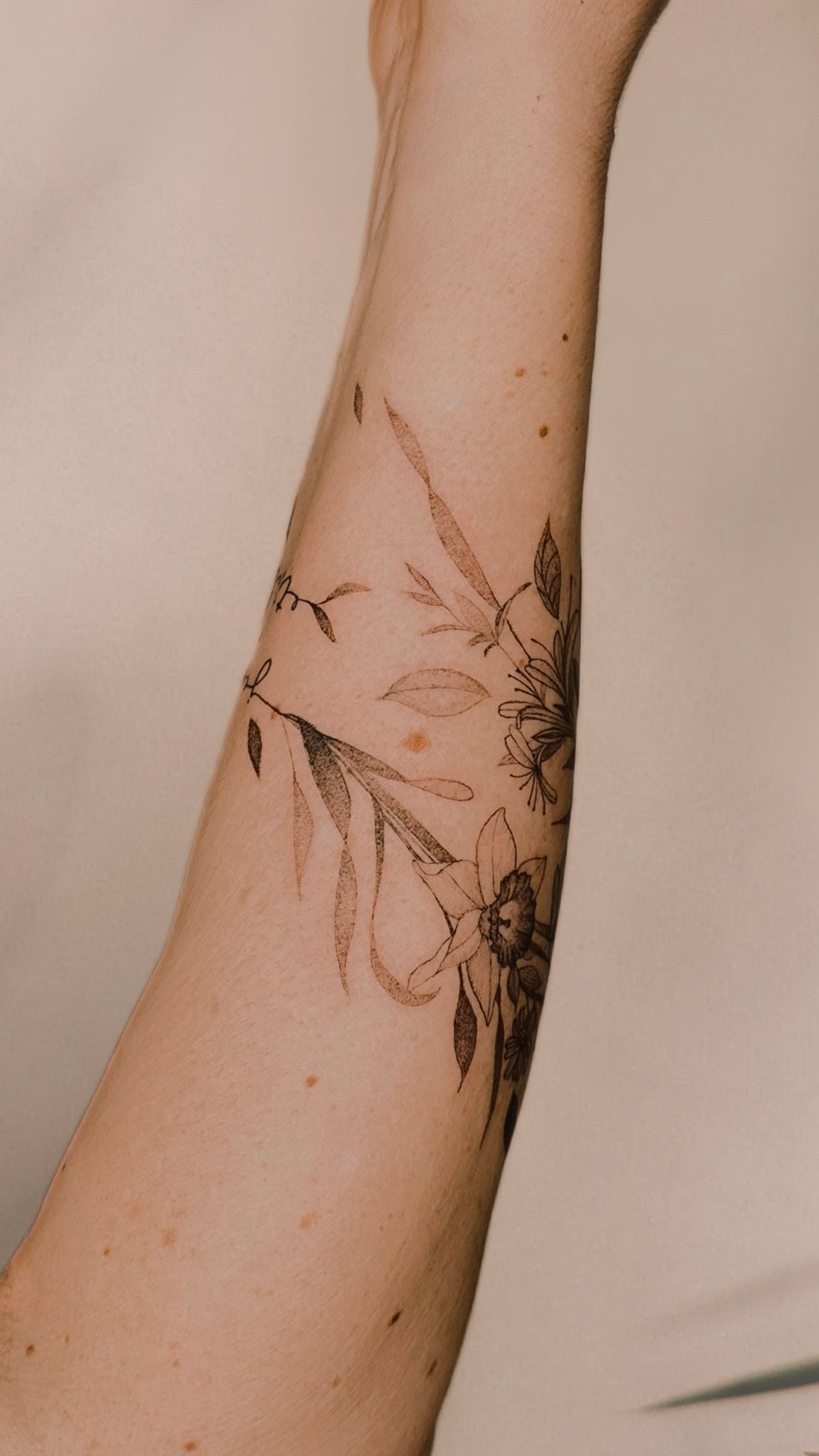 Flower Vine Wrap Around Arm Tattoo