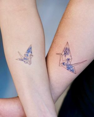 Paper crane matching tattoo with delft blue patterns