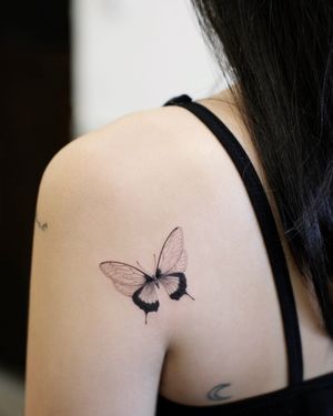 Delicate butterfly tattoo