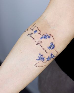 Lettering tattoo with delft blue pattern