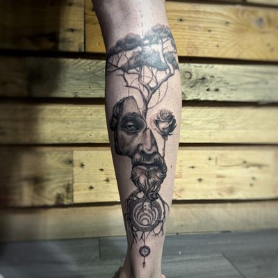 Black and grey realism and geometric tattoo