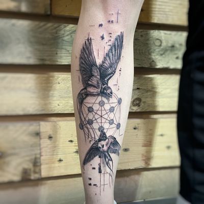 Black and grey geometric and realism tattoo