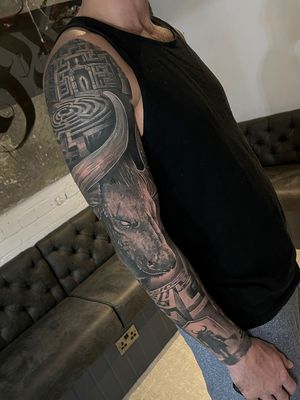  black and grey mythological minotaur cyclopes sleeve and coverup tattoo