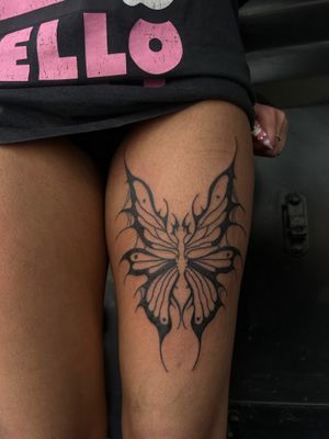 Embrace the beauty of nature with this striking neotribal butterfly tattoo design by the talented artist Zanzi La Vey.