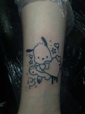 Express your love for Sanrio with this delightful, vibrant tattoo by the talented artist Zanzi La Vey.