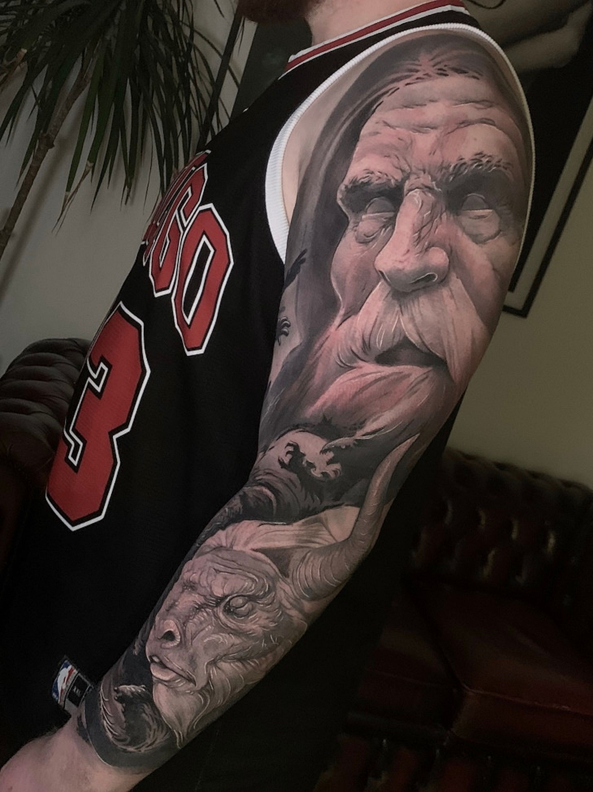 Old Man with Tattoo Sleeve Walks Through Time