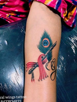 Peacock feather with basuri tattoo on inner forearm.....Tattoo done by @satishmandhare910 at royal wings tattoo studio mumbai🏬....📝Book your appointment on☎️ 8433934833....#peacock #peacockfeathertattoo #basuri#basuritattoo #morpankh #flute #flutetattoo#colourtattoos #tattoo #tattoos #tattooed #ink #inked #tattoodo #royal #wings #royalwings #royalwingstattoo #royalwingstattoos #royalwingstattoostudio #ghatkopar #ghatkopareast #mumbai #india