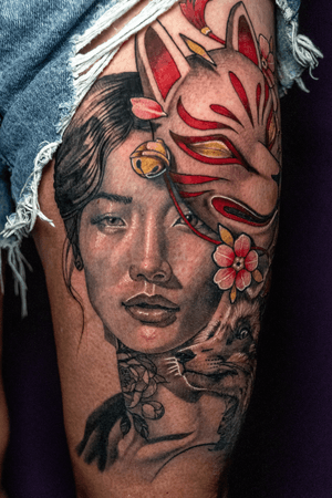 A fusion of traditional Japanese elements including a fox, geisha, and kitsune mask, expertly executed in black and gray realism by artist Warren Mullins.