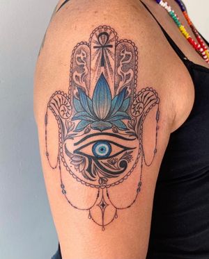 Dotwork style lotus, Eye of Horus, ankh, and hamsa design in New York.